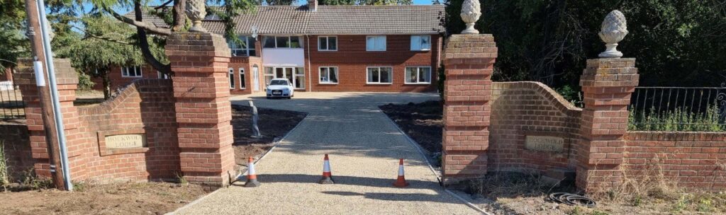 This is a photo of a newly installed chip and tar driveway, installed by Uckfield Driveways